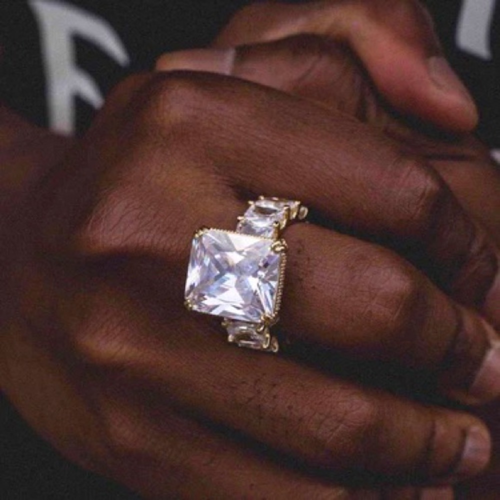 Center stone baguette band ring